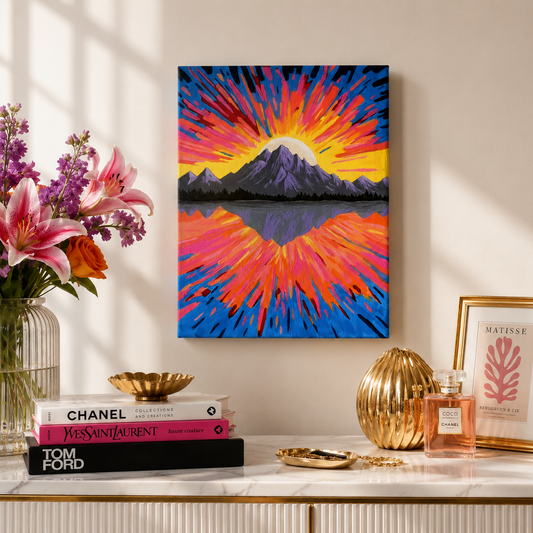 Colorful abstract painting on a wall above books and decorative items.